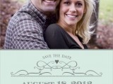 a colored couple’s photo as a base for a save the date magnet, with a green lower part where you can read the date