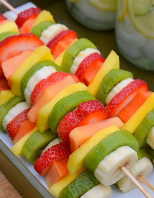 tropical fruit skewers will be nice and healthy appetizers for a summer bridal shower brunch