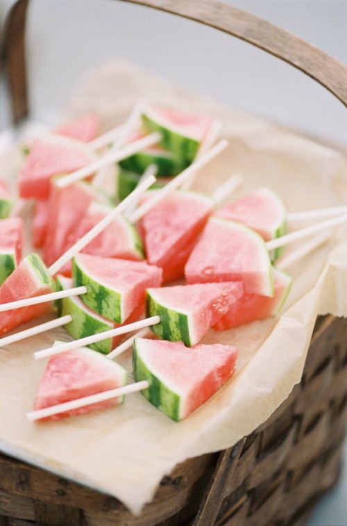 watermelon slices on sticks will be a nice and healthy low-calorie alternative to ice cream