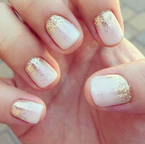 a white and gold glitter wedding manicure is a stunning and chic idea for a glam bride
