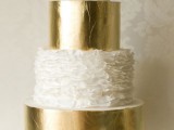 gold and white ruffle wedding cake of 4 tiers is a pretty glam idea for a modern and chic wedding