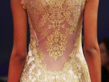a sleeveless white sheath wedding dress with gold lace appliques is a stunning idea to make a statement