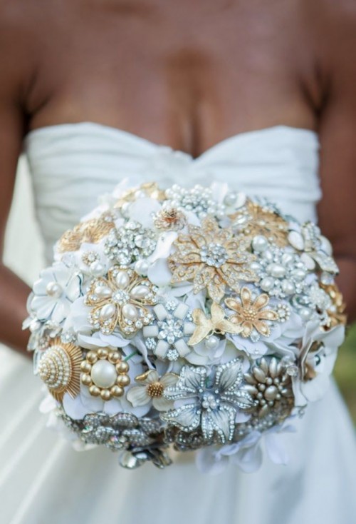 a refined white and gold brooch wedding bouquet shaped as a ball is a lovely idea to go for, perfect for a vintage wedding