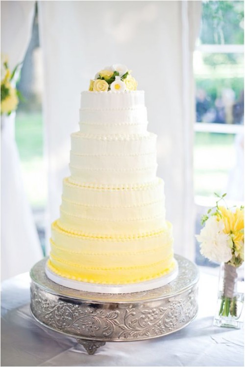 an ombre white to yellow textural wedding cake topped with yellow and white blooms is a bright idea for a spring wedding