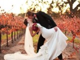 a very cool fall vineyard wedding portrait right in the vines gets maximum of the location