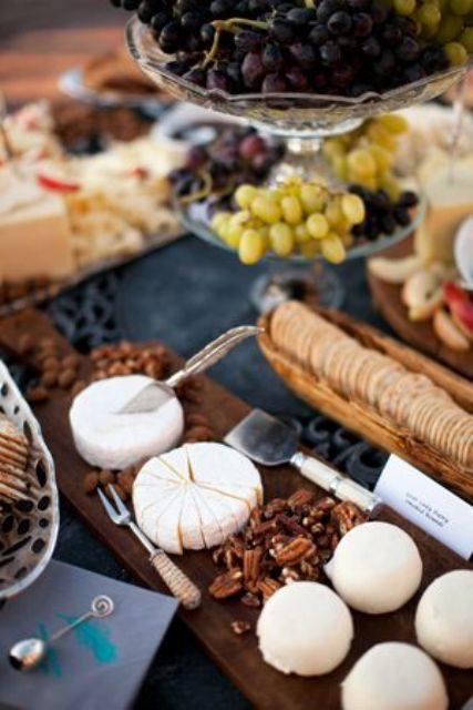 a gorgeous vineyard cheese board with cheese, grapes and nuts is an ideal solution for a fall vineyard wedding