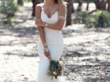 a lace mermaid wedding dress with a train, a V-neckline and spaghetti straps is a delicate and feminine idea for a sexy bridal look