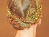 a whimsy wedding updo with braids and with a lovely wedding headband decorated with gold and orange beads
