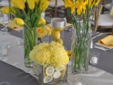 bright yellow spring wedding centerpiece with lemons are bold and cheerful for sunshine lovers