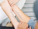 matching calligraphy tattoos on the forearms are a romantic solution for a couple tying the knot