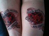 colorful heart locks with ribbons and keys, Spanish words for a bold and romantic forearm tattoo
