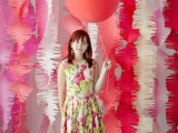 colorful fabric strips and bright balloons will make your backdrop super fun and super bold