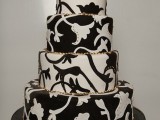 a black and white wedding cake with whimsical floral patterns is a unique and catchy idea