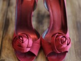 deep red fabric bloom wedding for a touch of color won’t overdo with reds yet will add a splash of color