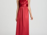 a deep red halter neckline maxi bridesmaid dress is a cool and bold idea to go for at a fall wedding