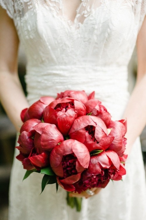 a deep red peony wedding bouquet is a statement idea for a fall or winter wedding