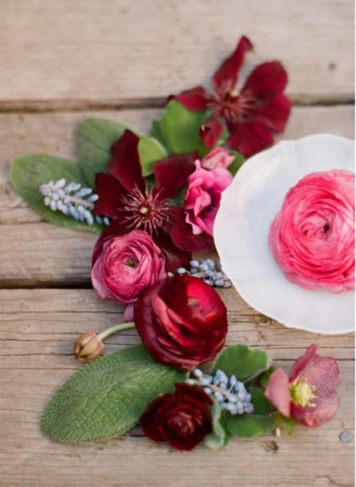 deep red blooms and greenery are perfect for bold fall wedding decor