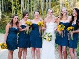 navy strapless mini bridesmaid dresses with draped bodices and layered skirts are great for an elegant fall wedding