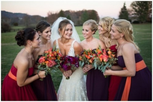 mismatching jewel-tone strapless bridesmaid dresses - deep purple, deep red and burgundy are amazing for a colorful fall wedding