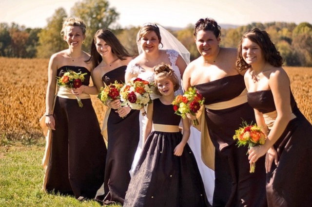 strapless brown A line maxi bridesmaid dresses with yellow sashes for a bright and contrasting fall wedding