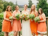 mismatching over the knee orange bridesmaid dresses paired with mismatching brown and gold shoes for a bright fall wedding