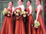 mismatching strapless and strap orange midi bridesmaid dresses are a very elegant and fall-inspired option with much color