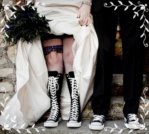 super tall black sneakers are a creative and fun idea for a Halloween wedding, they will make a statement with their color and are comfortable in wearing