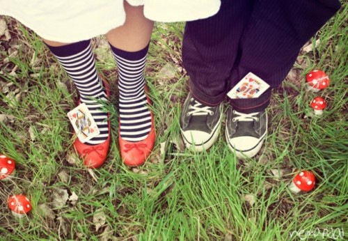 red flats paired with black and white striped stockings are a nice idea for a Halloween wedding, they can be rocked together for a bold look