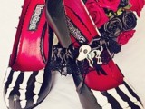 statement black skeleton shoes with red inner will be a nice idea for a Halloween bride, epspecially at a skeleton wedding