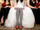 orange glitter shoes paired up with black and white stockings are a very playful and fun idea for a Halloween wedding