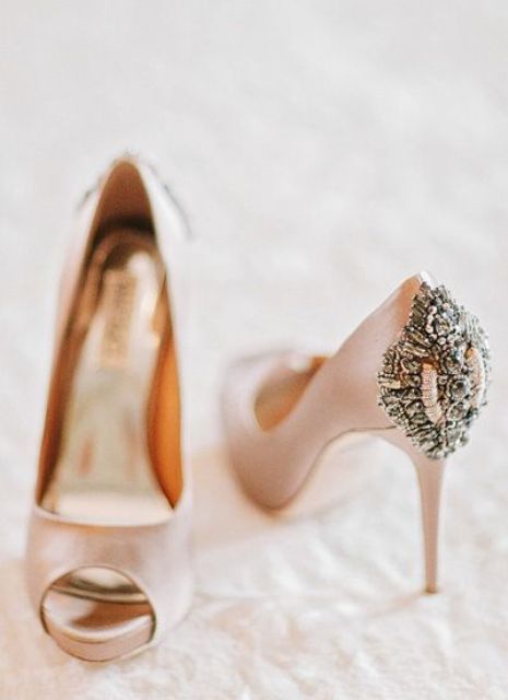 peachy pink peep toe wedding shoes with embellished backs and high heels are amazing for a chic and glam wedding in any season