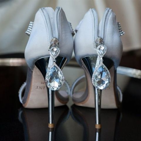 powder blue wedding shoes with embellishments on the sides and zips on the backs, with oversized crystal pendants look amazing and gorgeous