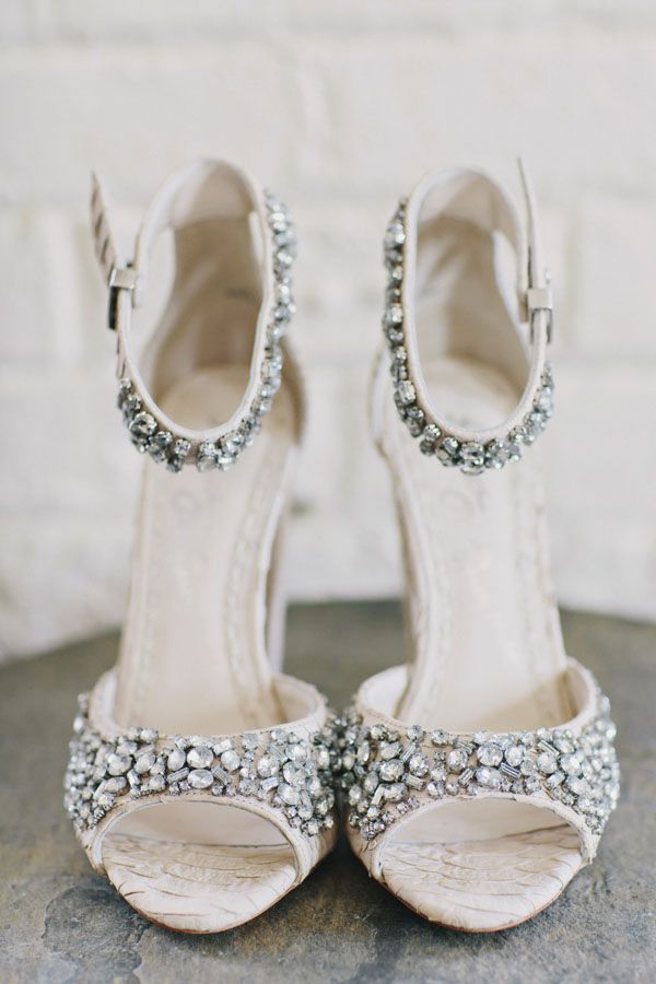 Gorgeous embellished ankle strap wedding shoes with peep toes will add a glam and glitz touch to your bridal look