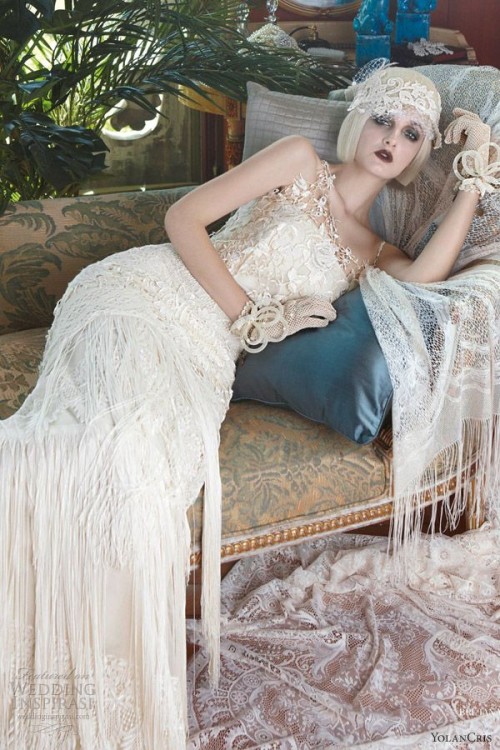a bold and chic 20s inspired bridal look with a unique embellished and lace wedding dress, with long fringe, a matching veil and gloves