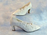white vintage wedding shoes with lace and embellishments that make it refined and chic