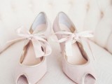 light pink peep toe shoes with blush bows add a slight touch of color and bring a romantic feel to the look