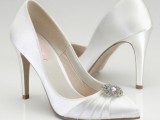 white vintage satin wedding shoes with embellishments and pointed toes are an elegant solution for a vintage bride
