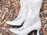 white vintage wedding boots of lace and white leather and lacing up add a cool vintage touch to the look