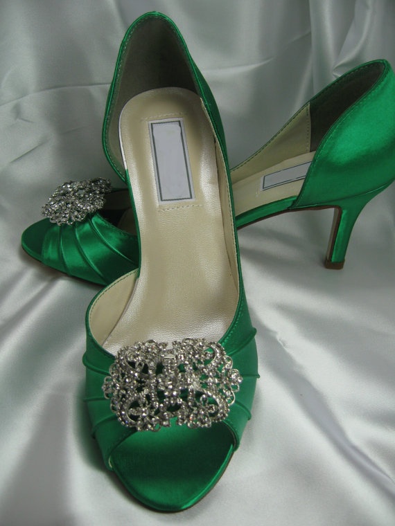 Emerald peep toe wedding shoes with heavy embellishments on top will ad a bright touch of color and chic to your look