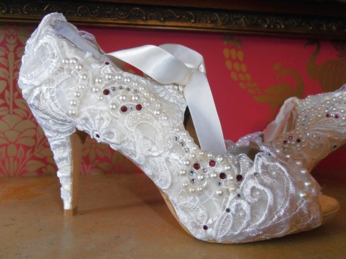 white lace fully embellished wedding shoes with peep toes look refined and bold