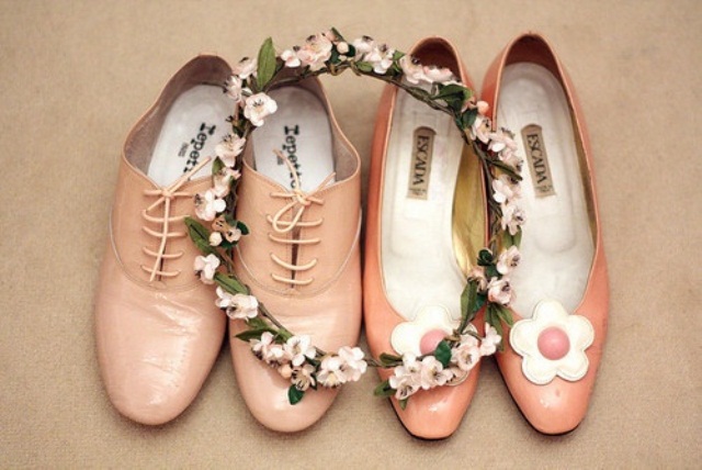 Vintage pink shoes with flowers on them add romance and a soft touch of color to the look