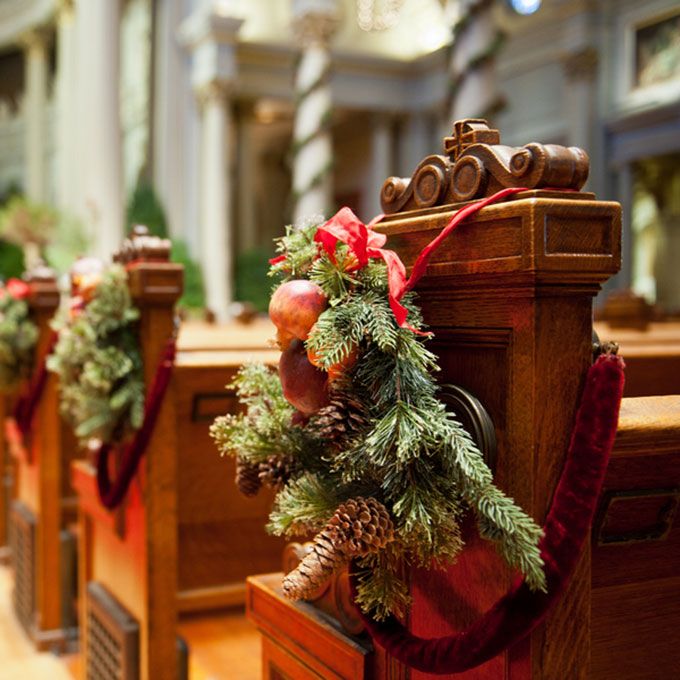 evergreens, pinecones, apples and red ribbons will make your wedding aisle very cool and very holiday like