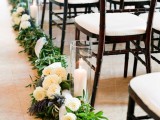 greenery, white blooms and pillar candles are traditional and elegant, they will bring chic to the space