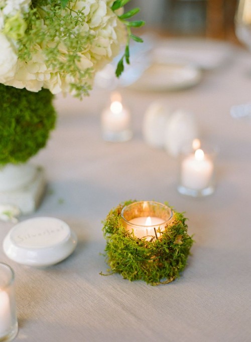 wrap candleholders with moss to make your space fresher and bolder