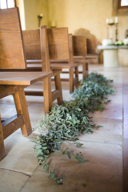 put lush greenery on the aisle to line it up in a natural way and even an indoor space will feel more like outdoors