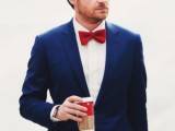 a navy suit, a white shirt and a bold red bow tie will make your look contrasting, bold and catchy