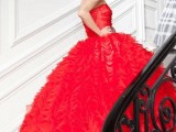 a hot red wedding ballgown with a draped bodice and a full ruffle skirt with a train is a lovely idea for a modern wedding with lots of color