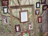 a lovely wedding decoration of picture frames of passed away family members and a sign telling about them is a cool DIY project