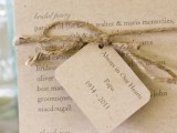 a wedding program with a tag in honor and memory of a person who passed away is a cool idea for a wedding