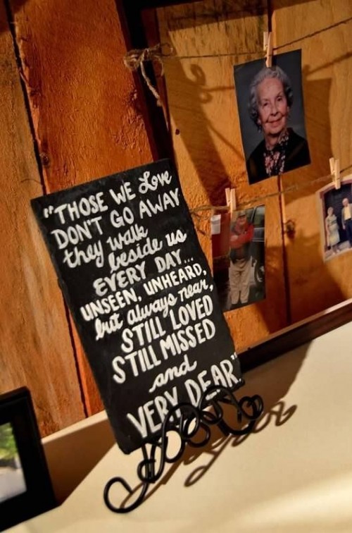 banners with photos and a chalkboard sign with a quote next to them is a lovely and sweet idea for every wedding